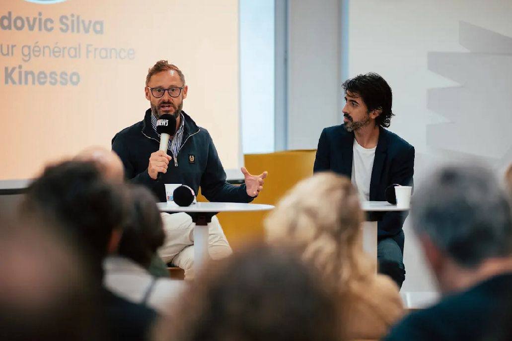 Neilson Hall speaking at an industry event